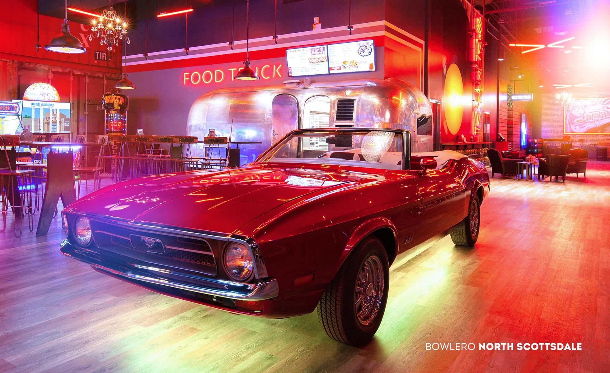 Red Mustang inside beautiful bowling alley