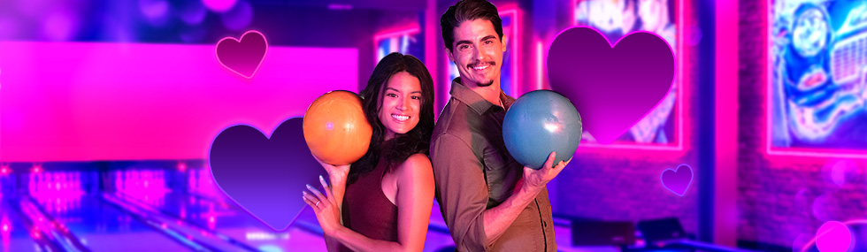 Two bowlers holding bowling balls in front of pink and purple background with hearts